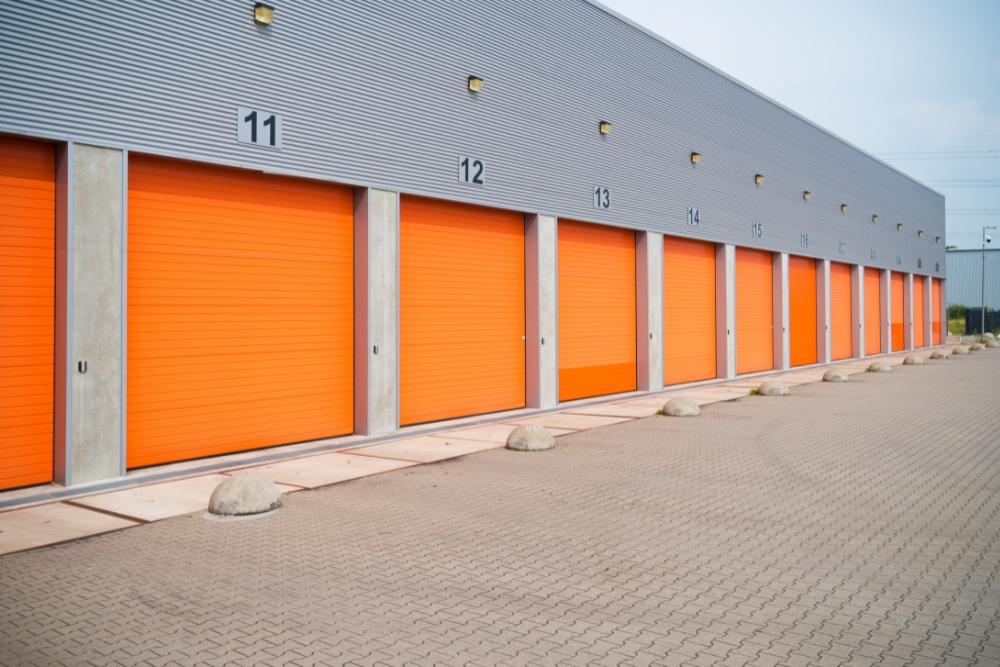 Orange roller shutters installed in a garage